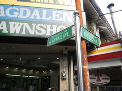Arnaiz Avenue at Libertad Road and Pasay Road intersection in Pasay City with Holy Trinity Parish Church and urban buildings