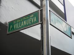 Libertad LRT Station and Arnaiz Avenue intersection in Pasay City with road signs and street view