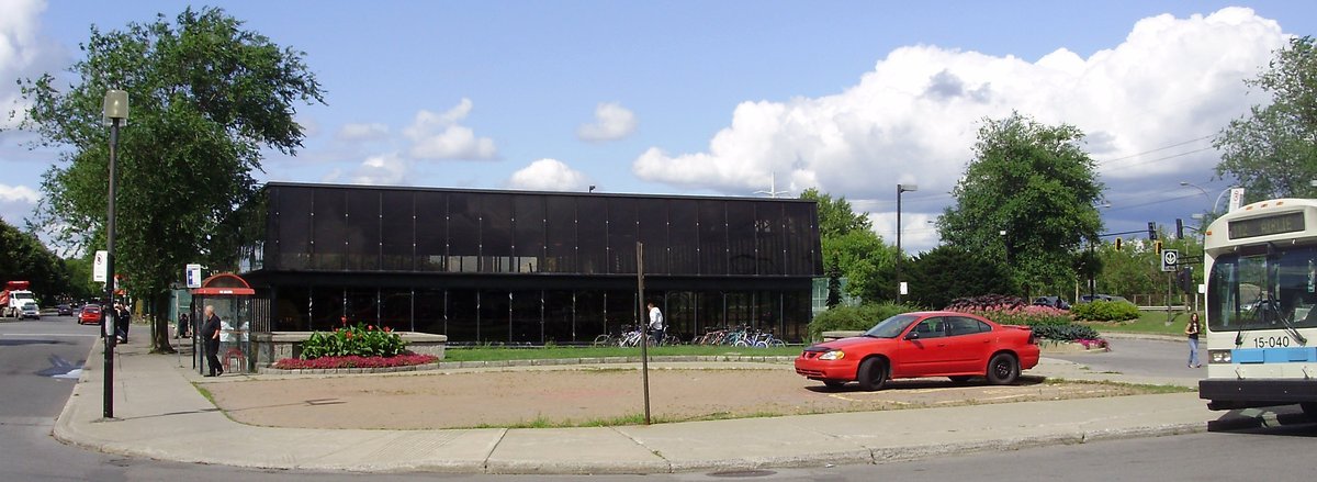 Jolicoeur metro station platform with modern design and train in Montreal