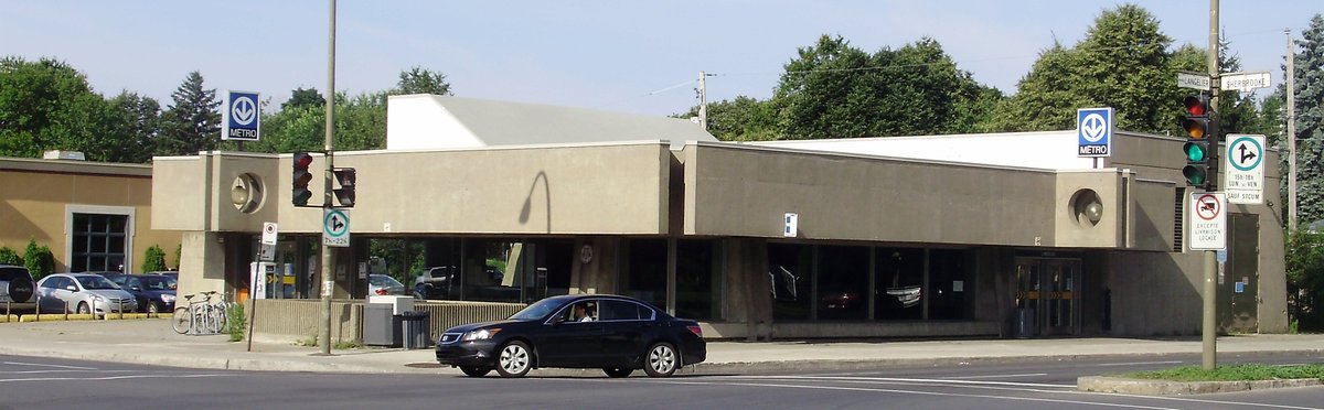 Langelier metro station in Montreal with distinctive architectural design and trains on tracks