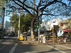 High-rise buildings along Chino Roces Avenue in Pio del Pilar, Makati City with clear blue sky