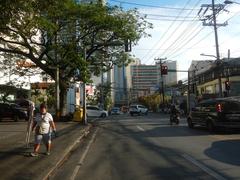 Aerial view of Chino Roces Avenue with Makati Cinema Square Tower and surrounding buildings in Pio del Pilar, Makati City, Philippines