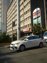 Makati cityscape with buildings along Chino Roces Avenue including Makati Cinema Square Tower and Plaza Fair