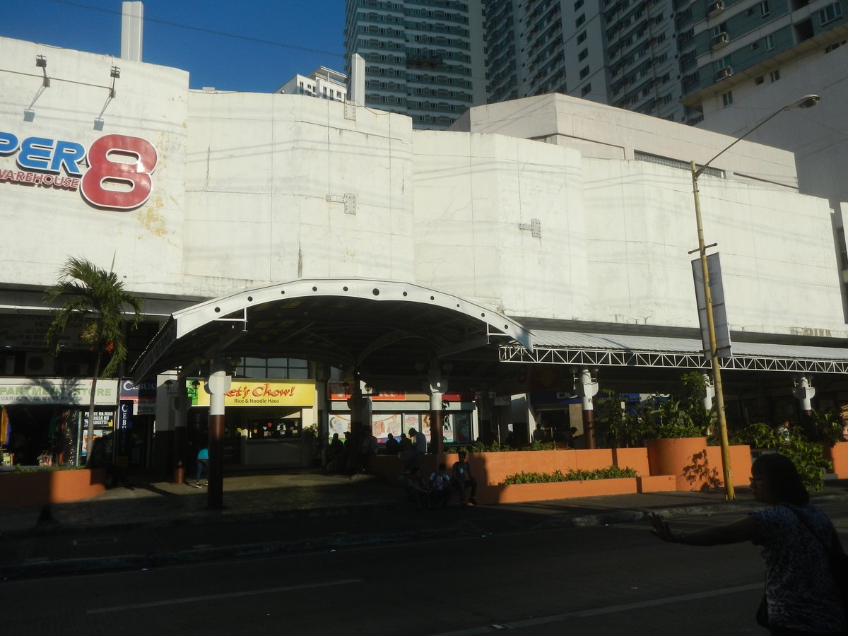 Downtown Makati City buildings along Chino Roces Avenue near Pio del Pilar, featuring Makati Cinema Square Tower and Plaza Fair