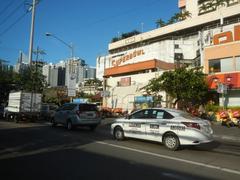 Urban buildings along Chino Roces Avenue in Pio del Pilar, Makati City with various commercial establishments and office towers