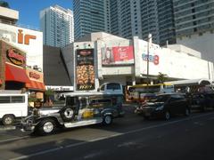 Aerial view of buildings and landmarks along Chino Roces Avenue and Pio del Pilar, Makati City, featuring Makati Cinema Square Tower, Plaza Fair, Super 8 Grocery Warehouse, and other notable structures