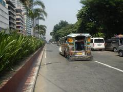 Kalaw Avenue and Rizal Park area in Manila with Luneta Hotel, Eton BayPark Manila, and Manila Bay along Roxas Boulevard