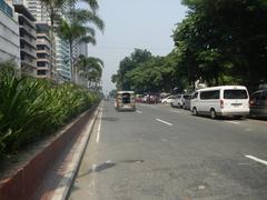 Kalaw Avenue and Manila Bay view with Luneta Hotel, Eton BayPark Manila, Rizal Park, Ermita district, and Roxas Boulevard in Manila City