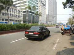 Kalaw Avenue and Rizal Park area with Manila Bay in Ermita, Manila showing landmarks like Luneta Hotel, Eton Baywalk Manila, Roxas Boulevard, Manila Ocean Park, and Quirino Grandstand.