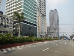 Kalaw Avenue view with Luneta Hotel, Eton Baywalk Manila, Rizal Park, and Manila Bay along South Road and Roxas Boulevard in Ermita, Manila