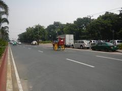 View of Kalaw Avenue, Luneta Hotel, Eton Baywalk Manila, Rizal Park, and Ermita district along Manila Bay near Roxas Boulevard