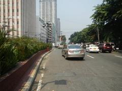 Kalaw Avenue and Rizal Park area in Manila with Luneta Hotel, Eton BayPark Manila, Manila Bay and South Road along Roxas Boulevard seen from above