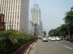 Kalaw Avenue with Luneta Hotel, Eton BayPark Manila, Rizal Park, and Ermita district in Manila along Manila Bay and Roxas Boulevard