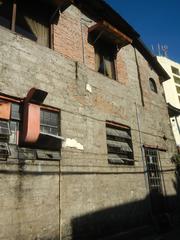 Kapitan Moy Residence heritage house and museum in Marikina City with historic monument and San Roque church visible
