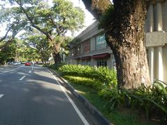 San Antonio Plaza along McKinley Road in Forbes Park, Makati City with lush greenery and modern urban surroundings