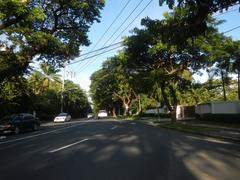 San Antonio Plaza along McKinley Road in Forbes Park, Makati City with modern buildings and streetscape