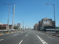 South Luzon Expressway and Metro Manila Skyway view from bus front window in Makati City, Philippines