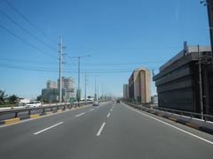 View of South Luzon Expressway and Metro Manila Skyway with cityscape in Makati City Philippines