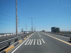 View of South Luzon Expressway and Metro Manila Skyway from a bus front window traveling from Makati City