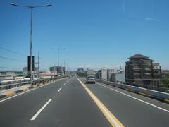 South Luzon Expressway and Metro Manila Skyway view from a bus driver's front window in Makati City