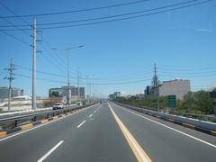 South Luzon Expressway and Metro Manila Skyway view from a bus in Makati City, Philippines