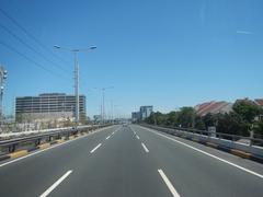 South Luzon Expressway and Metro Manila Skyway view from bus driver's perspective in Makati City