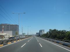 South Luzon Expressway and Metro Manila Skyway near Gil Puyat Avenue in Makati City with clear road and urban surroundings