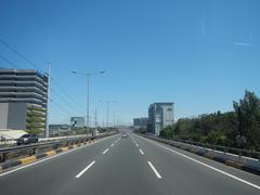 South Luzon Expressway and Metro Manila Skyway elevated highway view from a bus driver's seat