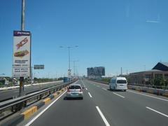 South Luzon Expressway and Metro Manila Skyway elevated highway and traffic in Makati City Philippines