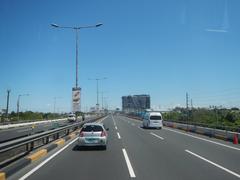 South Luzon Expressway and Metro Manila Skyway in Makati City with multiple lanes of traffic and elevated expressway structures