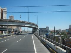 View of South Luzon Expressway and Metro Manila Skyway from a bus front window in Makati City