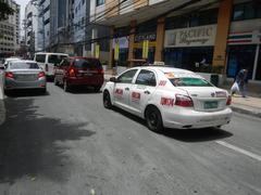 Tall residential and commercial buildings along Pablo Ocampo Street and Taft Avenue in Malate, Manila with Torre Lorenzo Plaza-Residences, Burgundy Westbay Tower, The Grand Towers, Pacific Regency, City Land, and Vito Cruz Towers visible