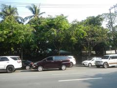 Paseo de Roxas road view with high-rise buildings in Makati Central Business District Philippines
