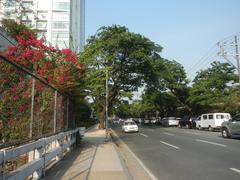 Zuellig Building and surrounding skyscrapers at the corner of Paseo de Roxas and Makati Avenue in Urdaneta Village, Makati City, Philippines, viewed from Buendia Flyover
