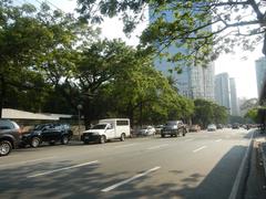 Zuellig Building and One Roxas Triangle skyscrapers at the corner of Paseo de Roxas and Makati Avenue in Makati City