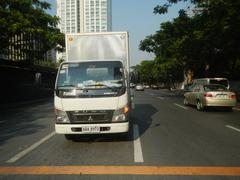 Zuellig Building and One Roxas Triangle at the corner of Paseo de Roxas and Makati Avenue in Makati City, Philippines from Buendia Flyover