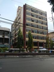 General Gregorio del Pilar Elementary School building near Abad Santos Avenue and Recto Avenue intersection in Manila with pedestrian footbridge