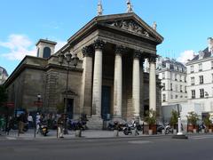 Notre-Dame-de-Lorette church exterior in Paris with clear blue sky