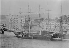The historic clipper ship Cutty Sark docked in a harbor
