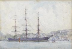 The Cutty Sark moored in Falmouth harbour with surrounding boats and harbor structures