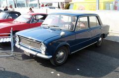 Fiat 124 Berlina parked on a road at Imola Circuit Italy