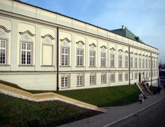 Front view of Royal Palace in Warsaw with blue sky and clouds