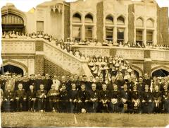 Group photo of Catholic Education Association members in front of Marquette Hall at Loyola University New Orleans in 1913