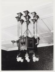 Interior view of Industria building bar with ceiling lamp and chandelier designed by Foeke Kuijpers at Dam 23-31