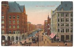 Historic black and white photograph of Dam Square and Rokin street in Amsterdam around 1916 showing people, carriages, and buildings