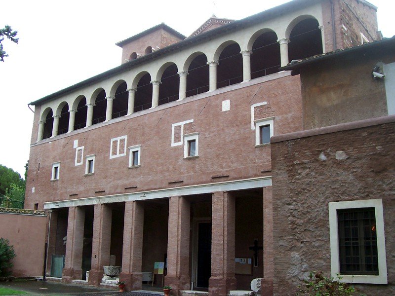 Exterior view of Basilica di S. Saba in Rome with ancient stone walls and architectural details