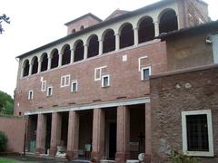 Exterior view of Basilica di S. Saba in Rome with ancient stone walls and architectural details