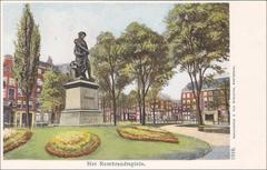 Het Rembrandtsplein square in Amsterdam in the 1910s-1920s with historic buildings and street activity