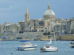 Aerial view of La Valletta city with buildings and sea in Malta