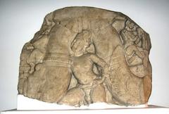 Stone sculpture of Amaravati garland bearer